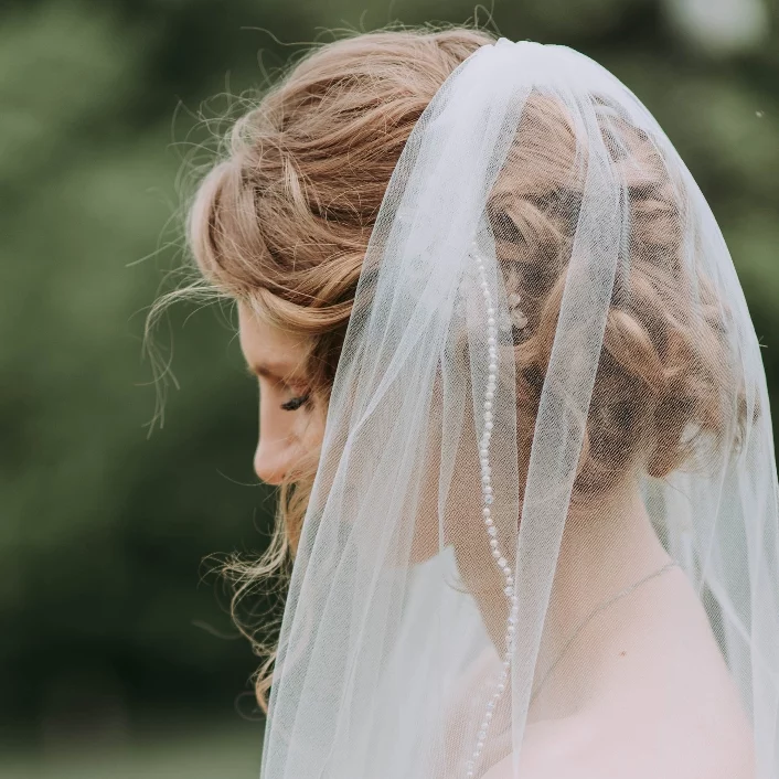 closeup of a bride wearing a veil